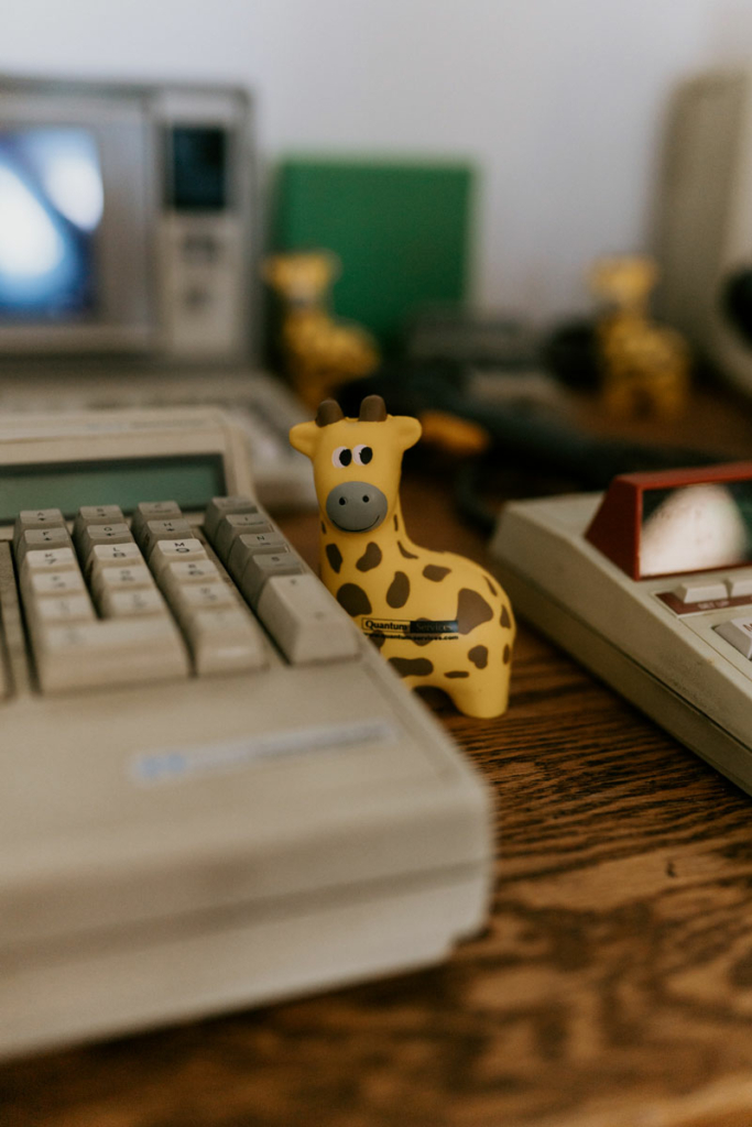 Quantum Services Giraffe Mascot